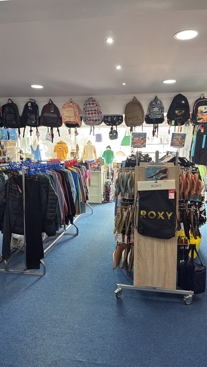 Selection of cskins, oneill, roxy and alder wetsuits at Hot Dog Surf Shop in Gower